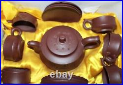 A set of Chinese Zisha pot, plate, tea cup 704
